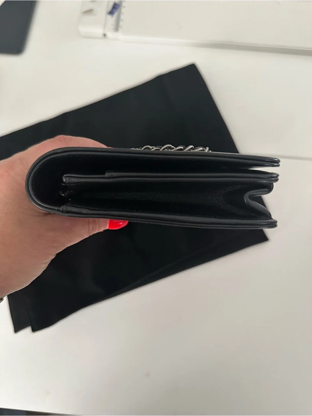 CHANEL Black Leather Clutch with Mixed Metal Chain Script